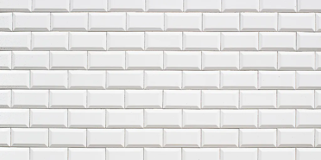 ¿Qué es un panel vinílico 3D autoadherible tipo azulejo?