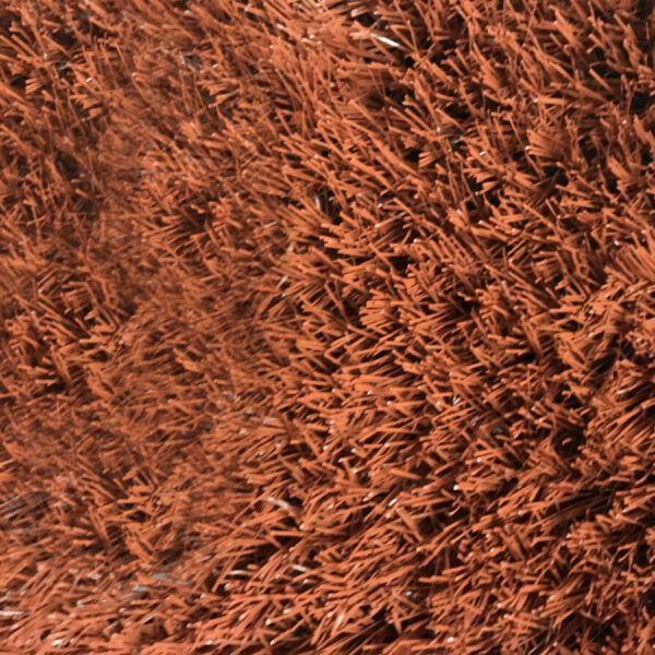Pasto sintético rojo
